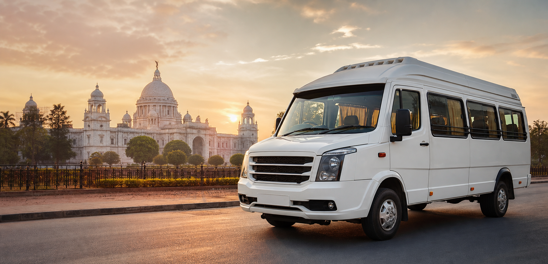 Luxury Tempo Traveller parked near a Kolkata landmark
